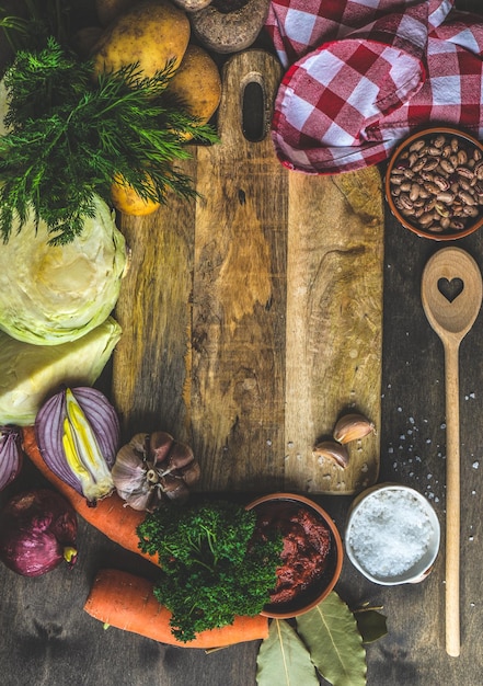 Kitchen tools and ingredients on wooden table
