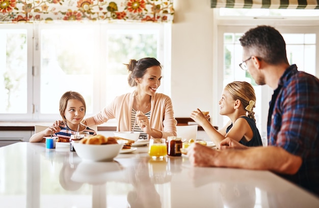 Happy family eating homemade meal
